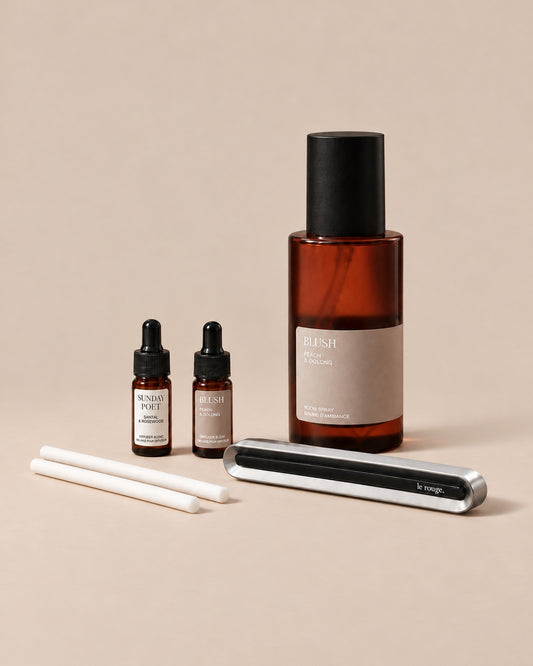 Home and Drive gift set with Blush room spray and complete LuxeDrive set on a plain beige background