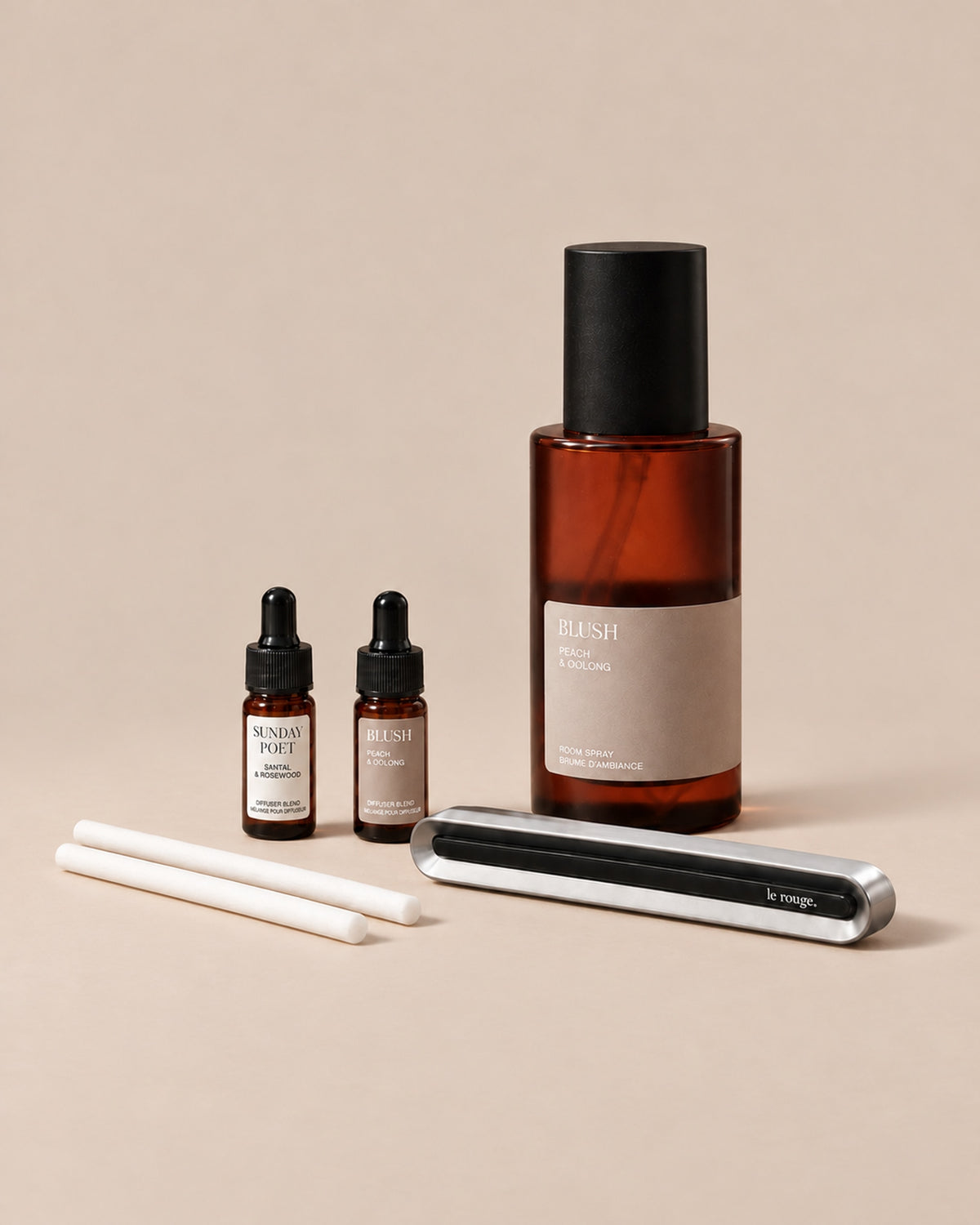 Home and Drive gift set with Blush room spray and complete LuxeDrive set on a plain beige background